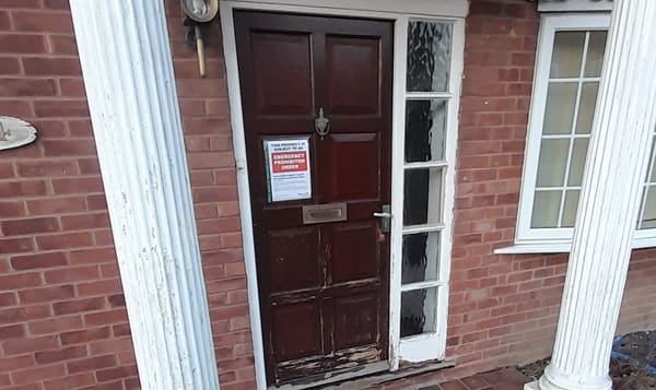 An enforcement notice on a door