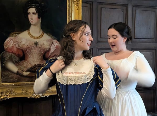 Two women in Victorian period costume